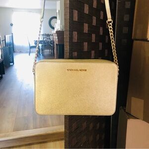 Michael Kors crossbody in Pale Gold.